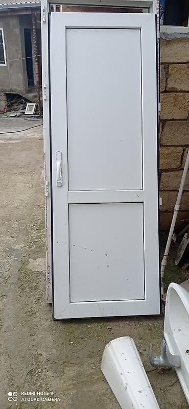 islenmis plastik qapi: PVC qapı – ağ rəng - Material: PVC profilli, iki panelli dizayn - — 1