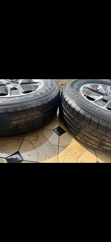 Колеса в сборе: Комплект из 5 колес Jeep на литых дисках. Характеристики: - — 2