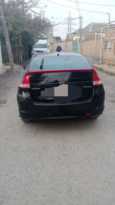 Honda: Honda Insight: 1.3 l | 2011 il Sedan — 5