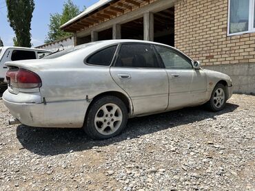 Транспорт: Mazda Cronos: 1.8 л | 1994 г. | Седан | Хорошее