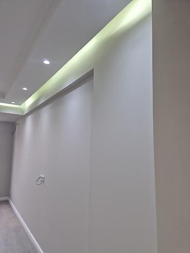 Təmir işləri: - Daxili dizayn: açıq-boz və ağ tonlarda müasir üslub, hamar divar — 10