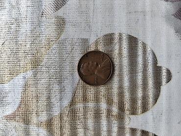 cent: Amerika Birləşmiş Ştatlarının bir sentlik qəpiyi. Bir tərəfində — 2