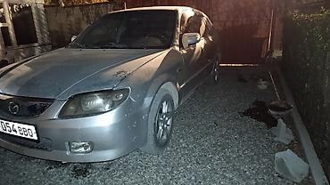 Mazda 323: 2003 г., 1.6 л, Автомат, Универсал