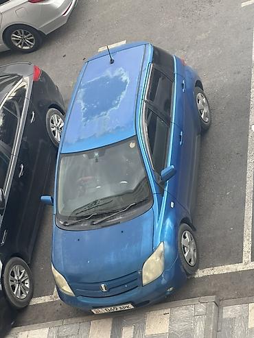 маш: Toyota Ist: 2003 г., 1.3 л, Автомат, Бензин, Хэтчбэк — 9