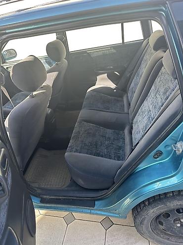Унаа: Toyota Carina: 1997 г., 1.8 л, Кол менен иштөөчү, Газ, Универсал — 1
