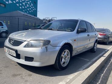 глушитель на мазду: Mazda 323: 2003 г., 1.3 л, Механика, Бензин, Хэтчбэк