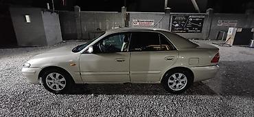 Продажа авто: Mazda Capella: 2001 г., 1.8 л, Механика, Бензин, Седан — 5