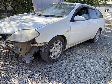 крыло на камаз: Nissan Primera: 2003 г., 2 л, Вариатор, Бензин, Универсал — 2