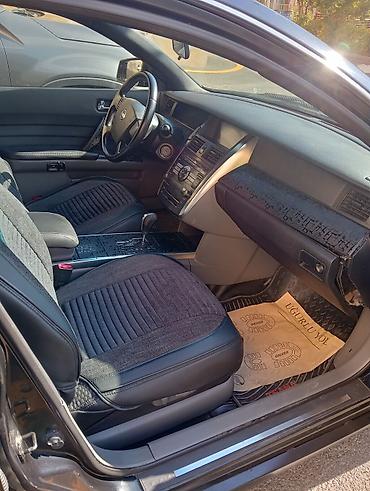 Транспорт: Nissan Teana – qara rəngli, geniş və komfortlu sedan. Xüsusiyyətlər — 6