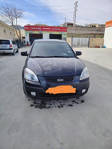 Kia: Kia Rio hatchback, qara rəng, 5 qapı. Texniki və salon: - Mexaniki — 7