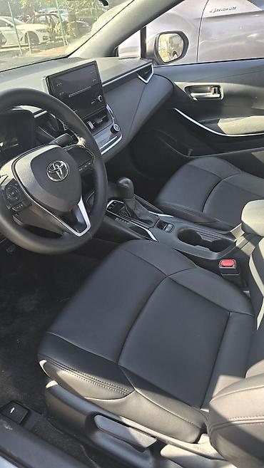 tayota karolla: Toyota Corolla: 2022 г., 1.8 л, Вариатор, Гибрид, Седан — 10