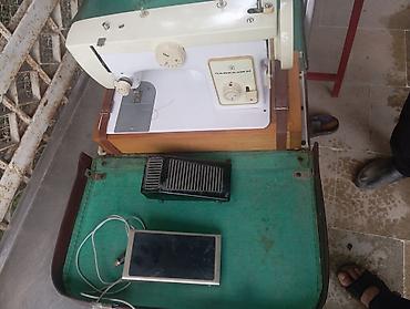 adam tərəzisi: Çayka-132M tikiş maşını.Hec islenmeyib.Teze kimidi.Basi cixan adam — 2