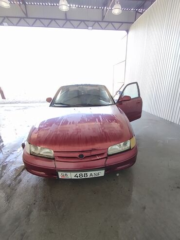 авто ока: Mazda 2: 1992 г., 2 л, Механика, Бензин, Хэтчбэк