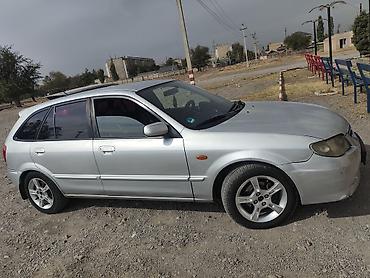 Транспорт: Mazda 323: 2002 г., 1.6 л, Механика, Бензин, Универсал — 3