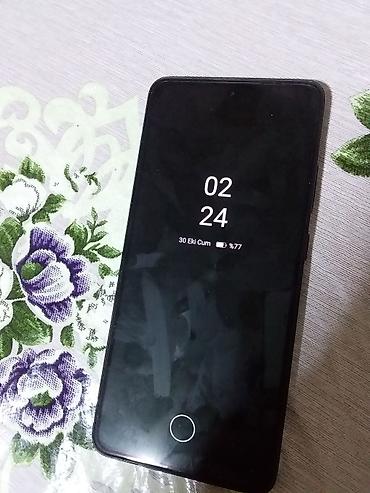 interlok tikis masini: Oppo Reno 12 F, 256 GB, rəng - Qara, Barmaq izi — 1