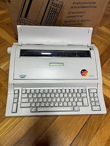 Ostali kućni aparati: Elektronska pisaća mašina OPTIMA SP 24 (Made in Germany) - — 1