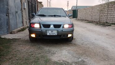 Iran Khodro: Samand sedan – benzinli, ön ötürücülü. Gümüşü rəng.nömrə nişanı — 3