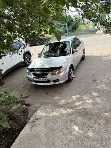 сх животные: Mazda Familia: 2003 г., 1.5 л, Автомат, Бензин