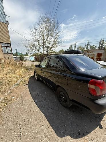 электро машине: Toyota Echo: 2002 г., 1.5 л, Автомат, Газ, Седан — 4