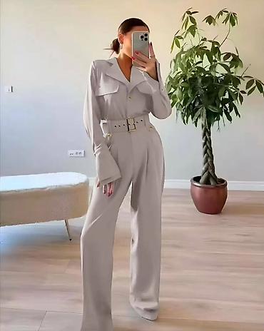 Kombinezoni: Ženski elegantni kombinezon sa pojasom - Kroj: dugi rukavi, široke — 4