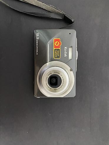 optical: Цифровая фотокамера Kodak с функцией Smart Capture. В комплекте — 2
