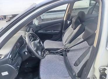 4 göz maşın: Nissan Sunny: 1.6 l | 2004 il Sedan — 6
