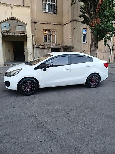 kredit vaz 2106: Kia Rio: 1.4 l | 2012 il Sedan — 6