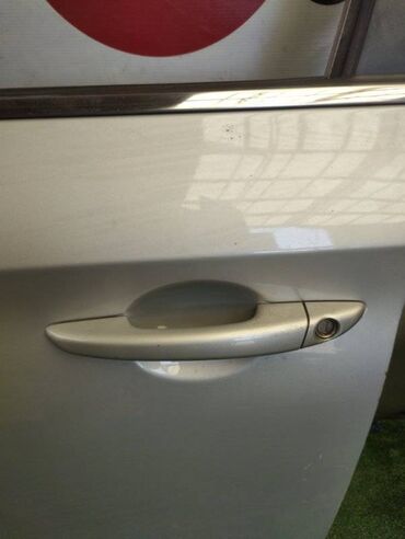 бордачок: Передняя левая дверная ручка Hyundai