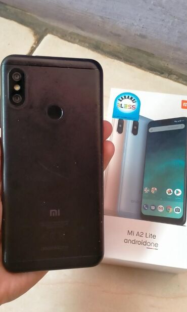 xiaomi mi: Xiaomi Mi A2, 64 ГБ, цвет - Черный, 
 Отпечаток пальца, Две SIM карты, Face ID