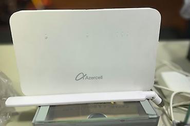 komputer dest: Azercell 4G/LTE Wi‑Fi router - Operator brendli, SIM kartla işləyən — 1