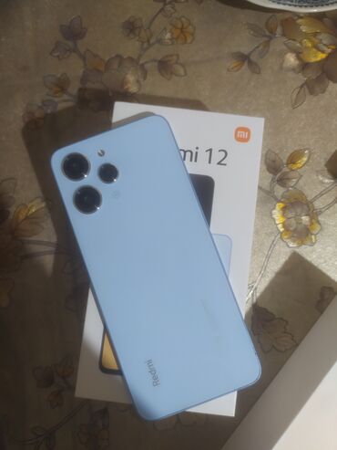 Xiaomi: Xiaomi Redmi 12, 256 GB, rəng - Mavi, 
 Zəmanət, Sensor, Barmaq izi