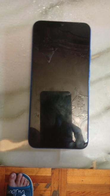 redmi a1plus: Xiaomi Redmi smartfon - Model: Redmi (mavi rəng, arxa hissədə “Redmi” — 1