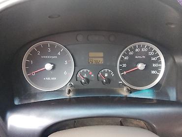 chery icar: Hyundai Porter II — тентованный малотоннажный бортовой грузовик — 5