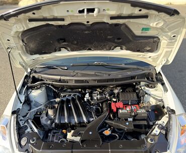 Nissan: Nissan Tiida: 1.5 l | 2011 il Hetçbek — 14