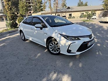 crown 2015: Toyota Corolla: 2020 г., 1.8 л, Вариатор, Гибрид, Седан — 4