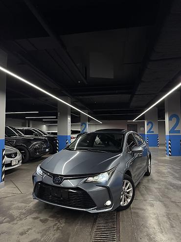 byd e2: Toyota Corolla: 2019 г., 1.8 л, Автомат, Гибрид, Седан — 1