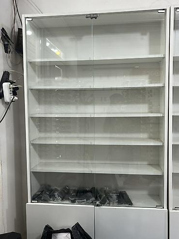 Şüşəli dolab vitrini, İşlənmiş, Ünvandan götürmə