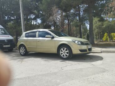 Opel: Opel Astra H – 5 qapılı hetçbek - Korpus: 5 qapılı, açıq-yaşıl rəng - — 1