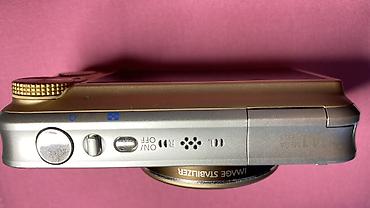 Canon PowerShot SX210 IS fotoaparatı satılır. Qızılı rəngdədir, çox az — 7
