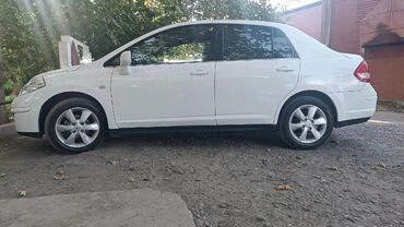 Nissan: Nissan Tiida: 1.8 l | 2011 il Sedan — 10