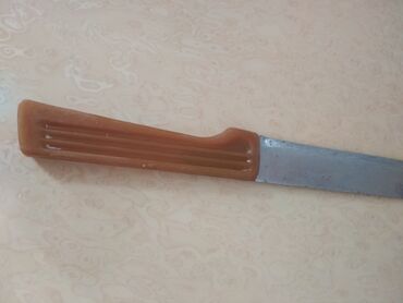 bicaq itiliyen: Sovet dövründən qalma yağ bıçağı. Uzunluğu 38 sm. Dəstəyinin uzunluğu