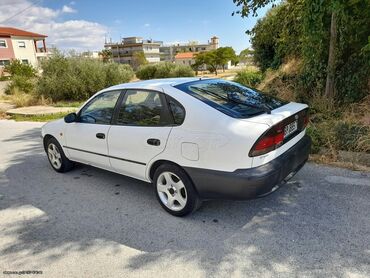 Toyota: Toyota Corolla: 1.3 l. | 1995 έ. Sedan — 4