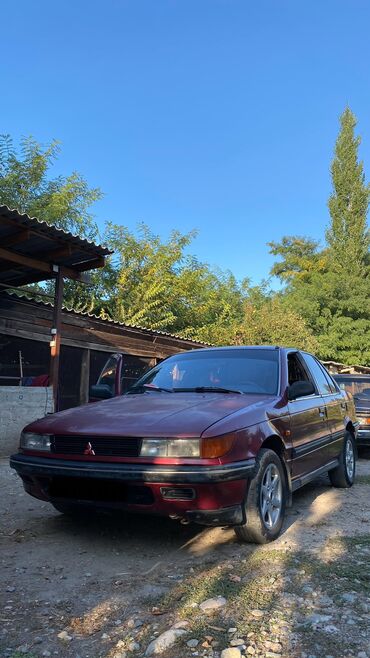 автомобиль ист: Mitsubishi Lancer: 1989 г., 1.5 л, Механика, Бензин, Седан