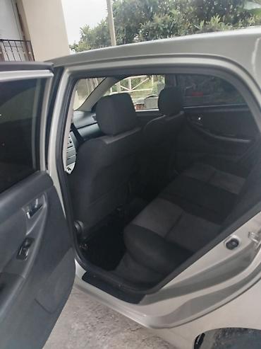 tra: Toyota Corolla hatchback (E120) – gümüş rəng. Texniki xüsusiyyətlər — 4