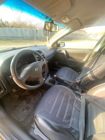 Opel: Model: Opel Astra Caravan (universal kuzov) Rəng: tünd boz Yanacaq — 2