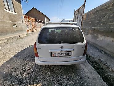 салон пассат б5: Opel Astra: 2000 г., Универсал — 4