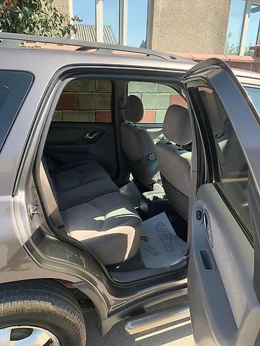 devo damaz: Mazda Tribute: 2002 г., 2 л, Механика, Бензин, Кроссовер — 6