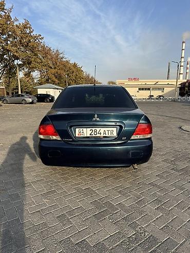 не спеша: Mitsubishi Lancer: 2004 г., 2 л, Автомат, Бензин, Седан — 4