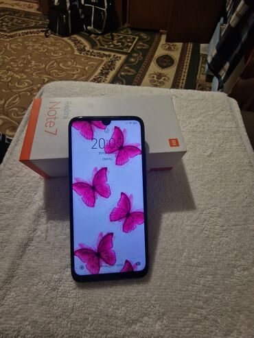 телефон флай фс 505 нимбус 7: Xiaomi Redmi 7, 64 ГБ, цвет - Черный, 
 Отпечаток пальца