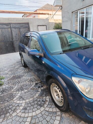 Opel: Opel Astra H Caravan (universal), göy rəng. - Kuzov: universal — 6